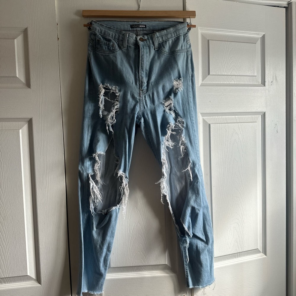 Fashion nova very distressed, light wash jeans, size 5